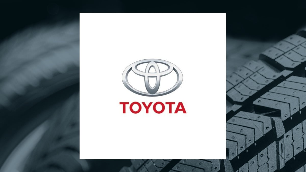Toyota Motor logo with Auto/Tires/Trucks background